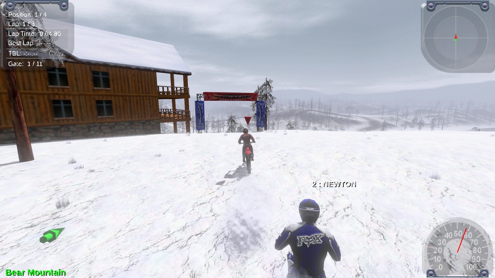 Snowy enduro course by a ski lodge